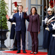 France’s President Emmanuel Macron welcomes US Vice-President Kamala Harris (R) upon arrival for the International conference on Libya at the Maison de la Chimie in Paris on November 12, 2021.